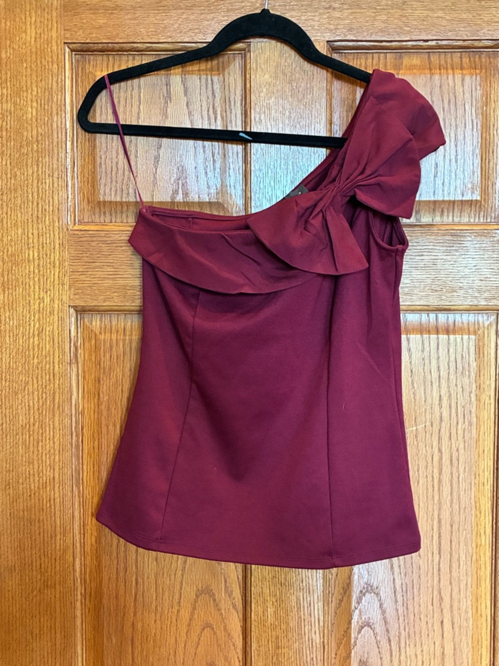 The Limited One-Shoulder Ruffle Top in Burgundy